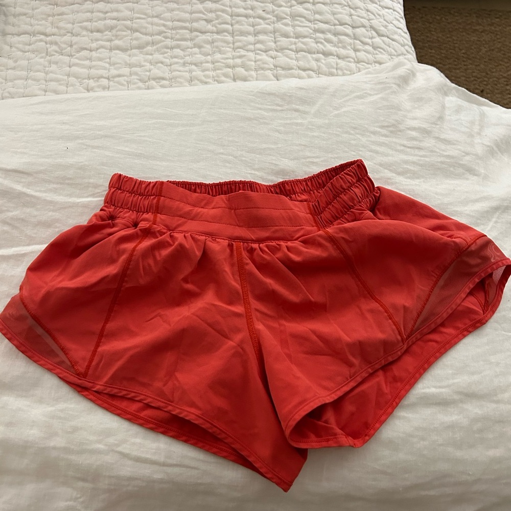 Coral/salmon lululemon shorts size 4 (2.5”)